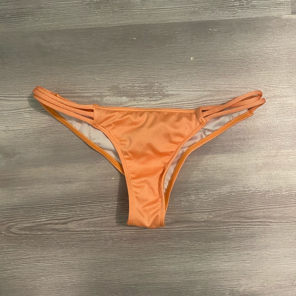 NWOT Victoria’s Secret extra small strapy orange Itsy bikini bottom